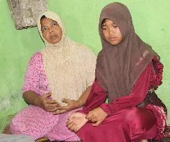 Girl swept away by 2004 tsunami reunited with family
