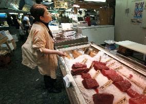Journalist visits whale meat shop to examine theory of food culture