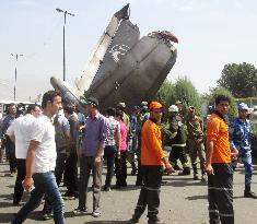 Airliner crashes in Tehran