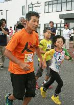 Comedian Hazama jogs ahead of marathon in Tohoku