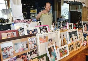 Man fills home with late wife's photos
