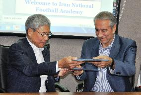 Japan, Iran soccer associations ink cooperation accord