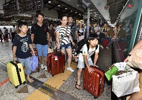 Summer holiday exodus peaks