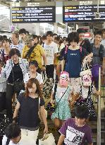Return rush of summer vacationers peaks in Japan