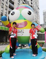 Japanese athletes with Youth Olympic mascot