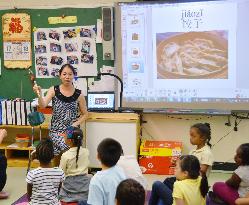 N.Y. primary school pupils learn Chinese
