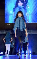 Fashion show held to promote indigo-dyed clothing