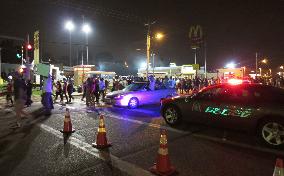 Residents march to protest Michael Brown's death