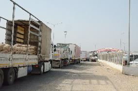Long queue of trucks at Turkey checkpoint bordering Syria