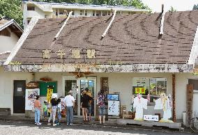 Tourists wait for tram ride on old railway line