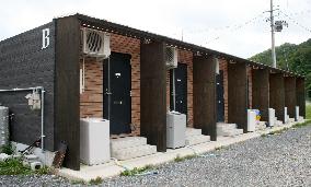 Shipping containers provide housing in quake-hit city