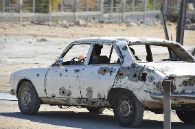 Car with bullet holes in Gaza