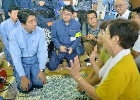 Abe visits disaster-hit area