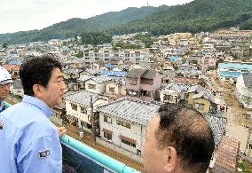 Abe visits mudslide-hit area in Hiroshima