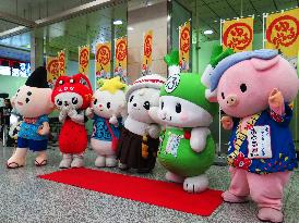 Mascot characters form "party" to vivify local economies
