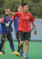 Japan national hockey team coach in action