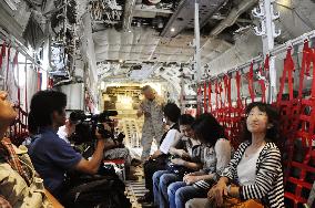 Reporters experience flight aboard U.S. air tanker