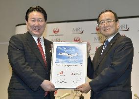 JAL to buy 32 small Mitsubishi jet aircraft
