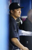 Yankees' Tanaka heading back to N.Y. with arm soreness
