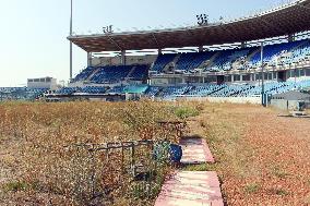 Athens Olympic baseball park covered with weeds