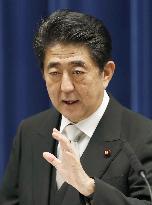 Abe reshuffles Cabinet to tighten grip on power