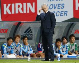 Japan coach Aguirre watches team lose 2-0 to Uruguay