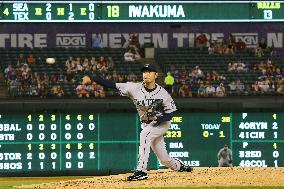 Iwakuma ties career-high with 14th victory