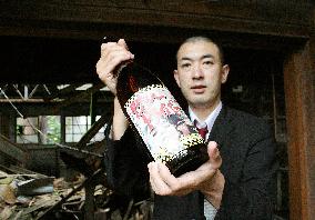 Quake-damaged sake brewer vows comeback