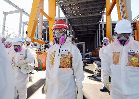 New industry minister Obuchi visits Fukushima plant