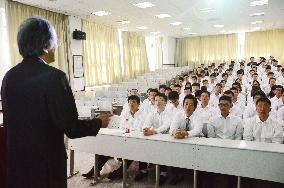 China, Japan universities co-found school in Dalian