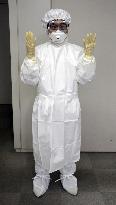Tokyo to send 100,000 protective suits to W. Africa