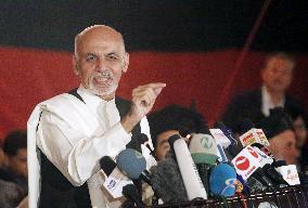 Afghan presidential candidate Ghani speaks to press