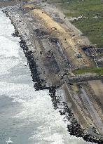 Levee under construction on tsunami-hit beach in Fukushima