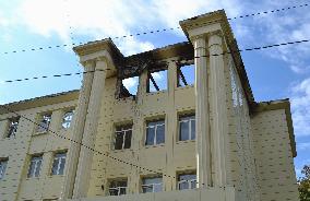 School in eastern Ukraine's Donetsk damaged by rocket