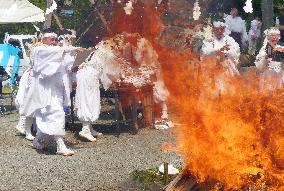 Fuso-kyo grassroots Shinto priests perform fire ritual
