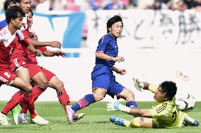 Japan beat Nepal to reach last 16 in Asian Games soccer