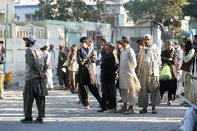 Afghan day laborers gather for jobs on Kabul street