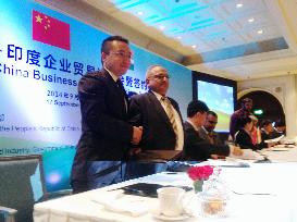 Chinese, Indian firms strike business deal in New Delhi