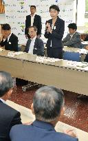 Industry minister Obuchi visits Fukushima village