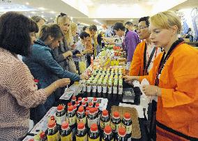 Russians check out soy sauce at fair in Vladivostok