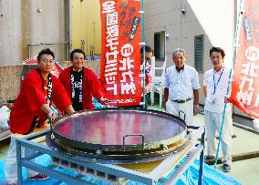 Huge iron pan made for national dumpling festival