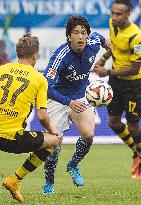 Uchida hangs tough in Schalke's win over Dortmund