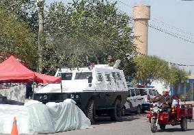 Chinese armored vehicle stands guard in Xinjiang Uygur