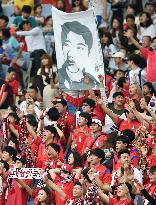 Korean independence hero's portrait at soccer match