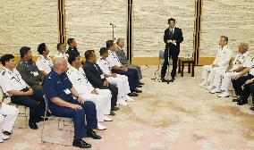 Japan PM Abe meets Asian coast guard officials
