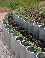 Flowerbeds made of recycled uranium fuel containers