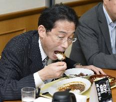 Japan FM eats whale meat curry at Foreign Ministry