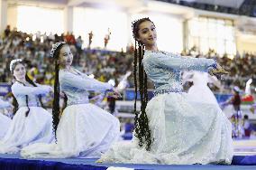 Uzbek girls dance at world wrestling event in Tashkent