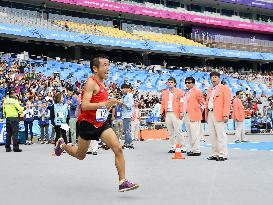 Hiroshi Neko competes in Asian Games marathon