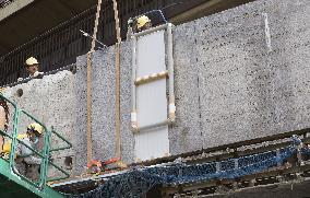 Memorial slabs removed from National Stadium for demolition